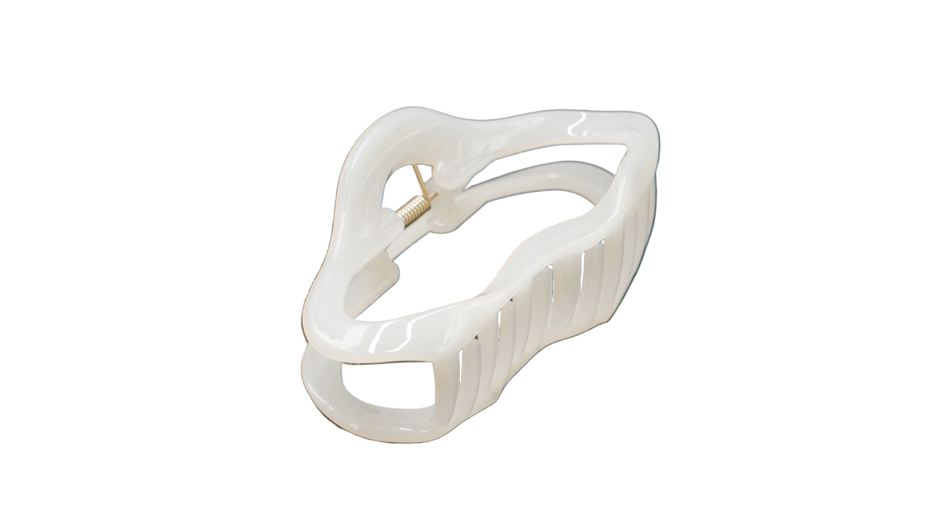 White ceramic hair clip on a  background