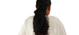 Person wearing a black headscarf with a ponytail on a beige background