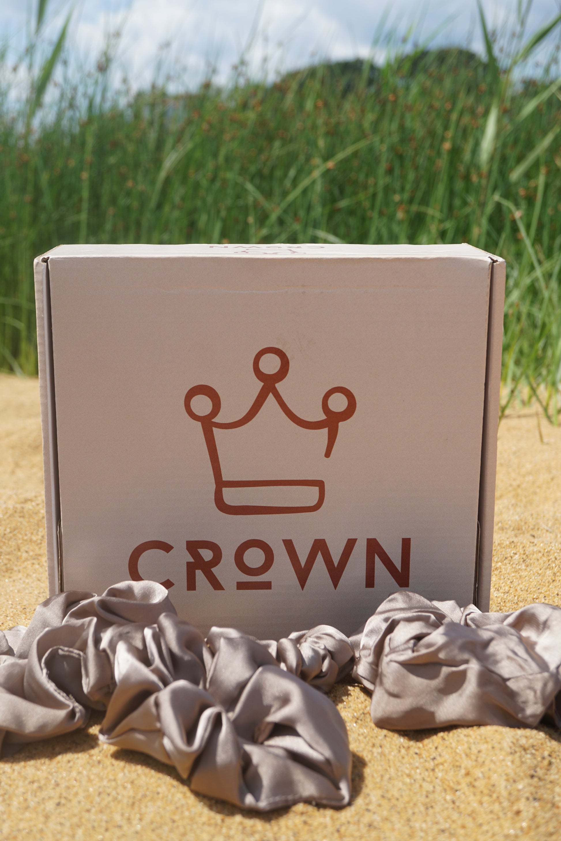 Crown box with scrunchies on a natural background