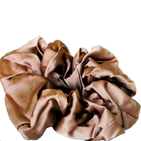 Three Golen scrunchies on a white background